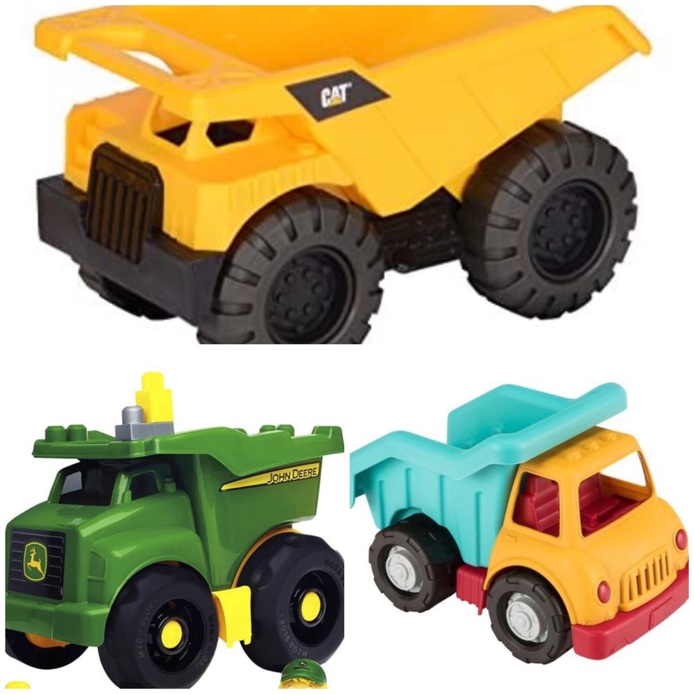 Lot of toy dump trucks -3 play trucks